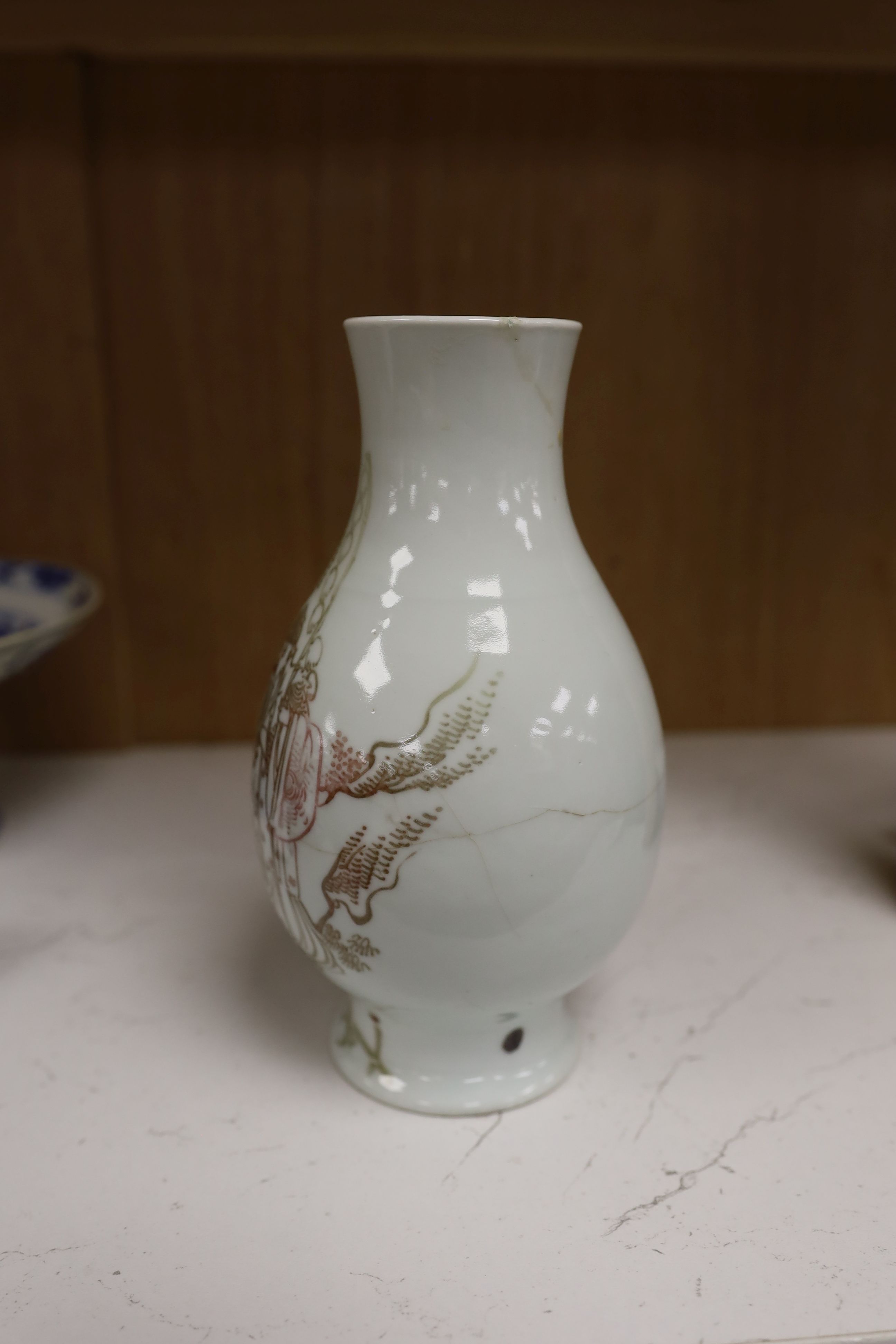 A Chinese underglaze copper red ‘herder and goats’ vase, Kangxi six character mark but Republic period and a Chinese blue and white lotus stem dish, six character Guangxu mark and period, both damaged
